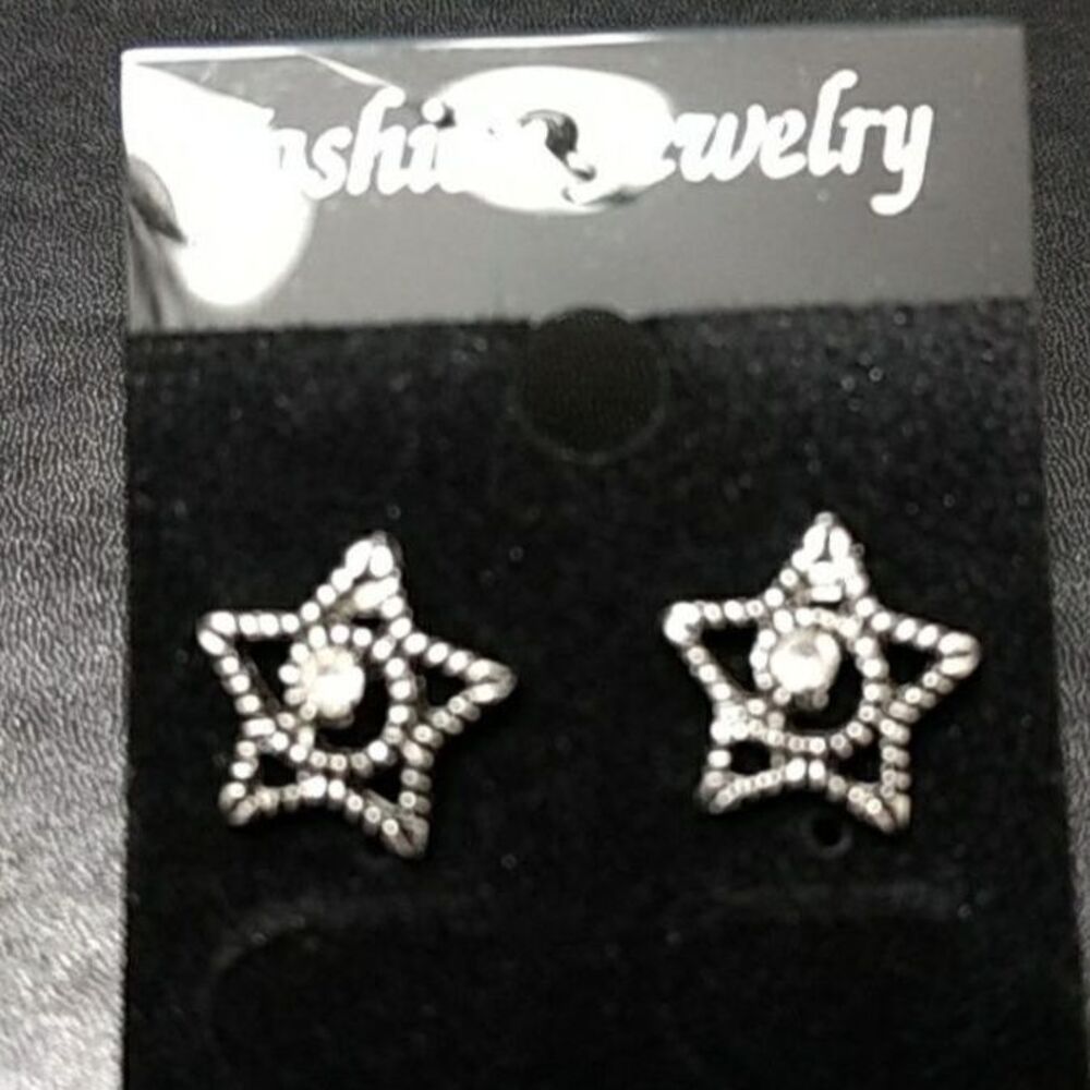 Silver tone rhinestone star earrings